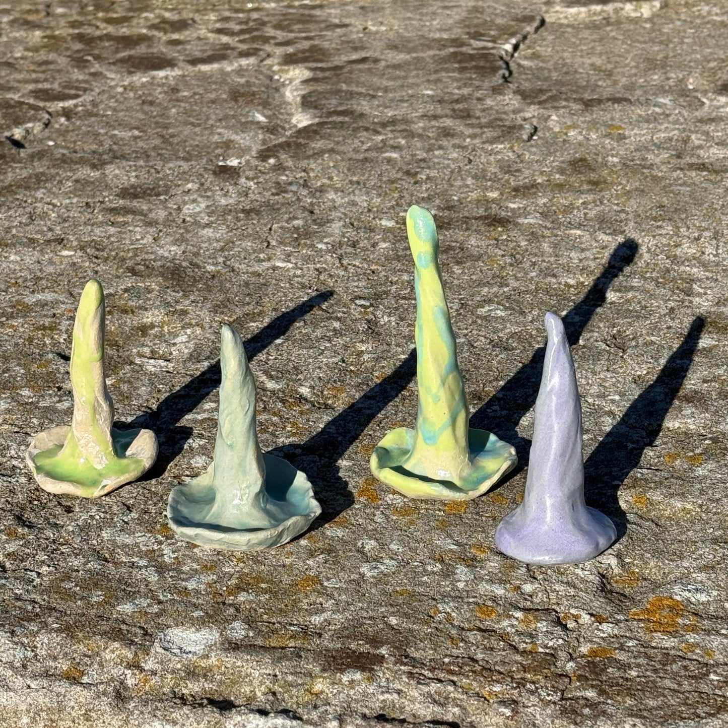 ceramic organically shaped handmade ring cones in greeen, turquoise and purple