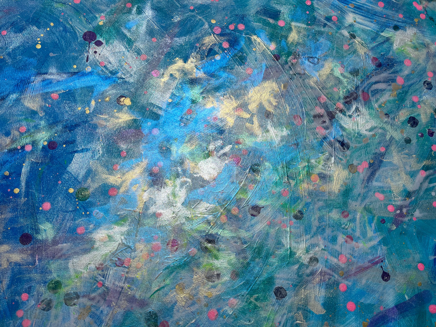 Abstract artwork with a mix of blue, white, and pink colors.