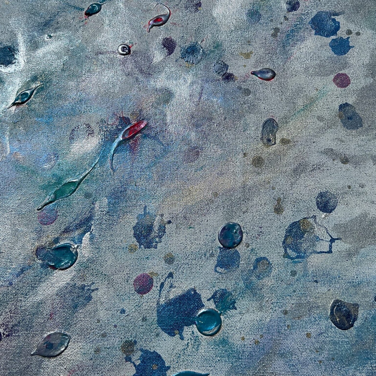 Abstract artwork with colorful splashes on a textured surface