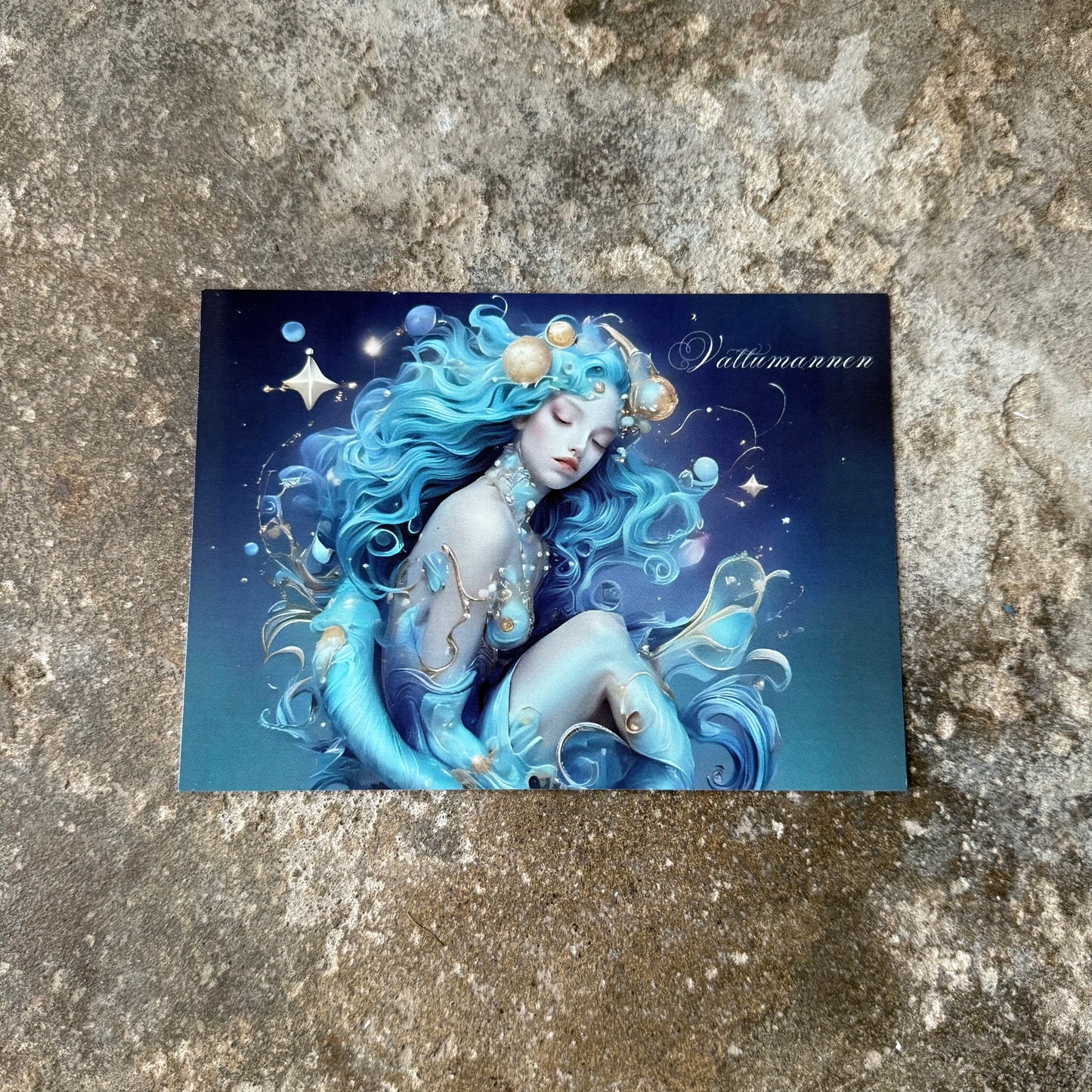 Mermaid illustration with blue hair and tail on a textured stone surface as thee star sign aquarius