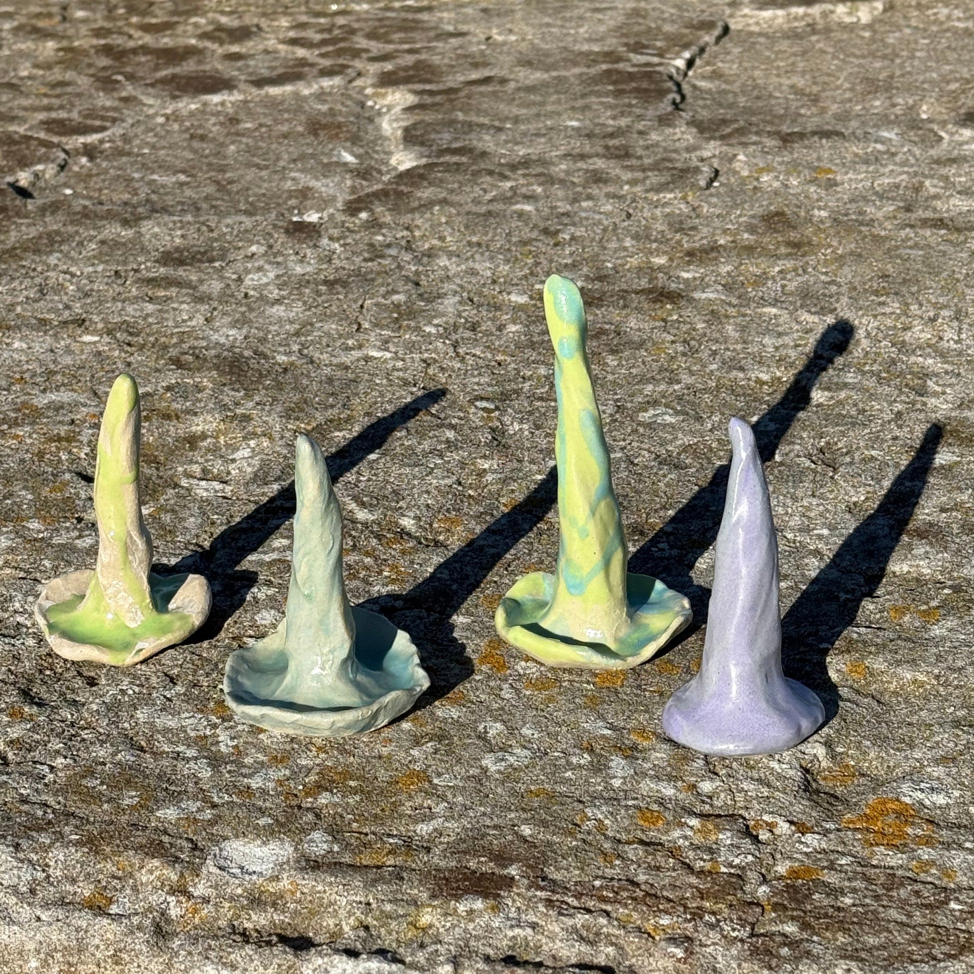 ceramic organically shaped handmade ring cones in greeen, turquoise and purple 