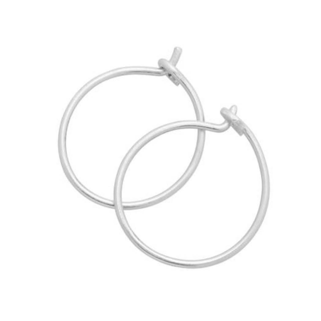 Silver hoop earrings displayed on a white background with 'atelierdesiree.se' branding.